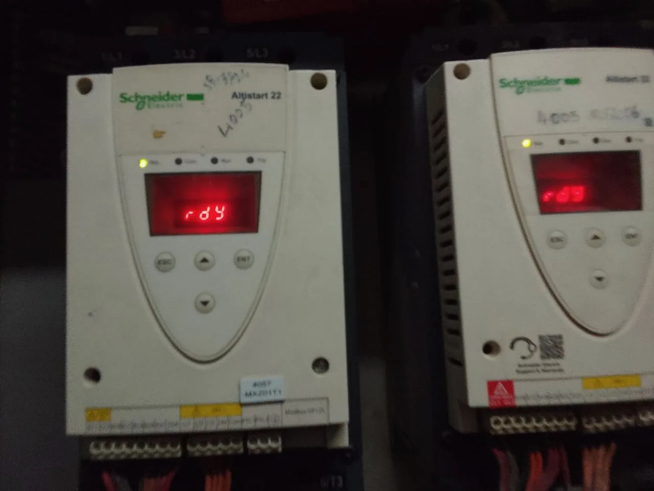 Two Schneider soft starters showing fault codes