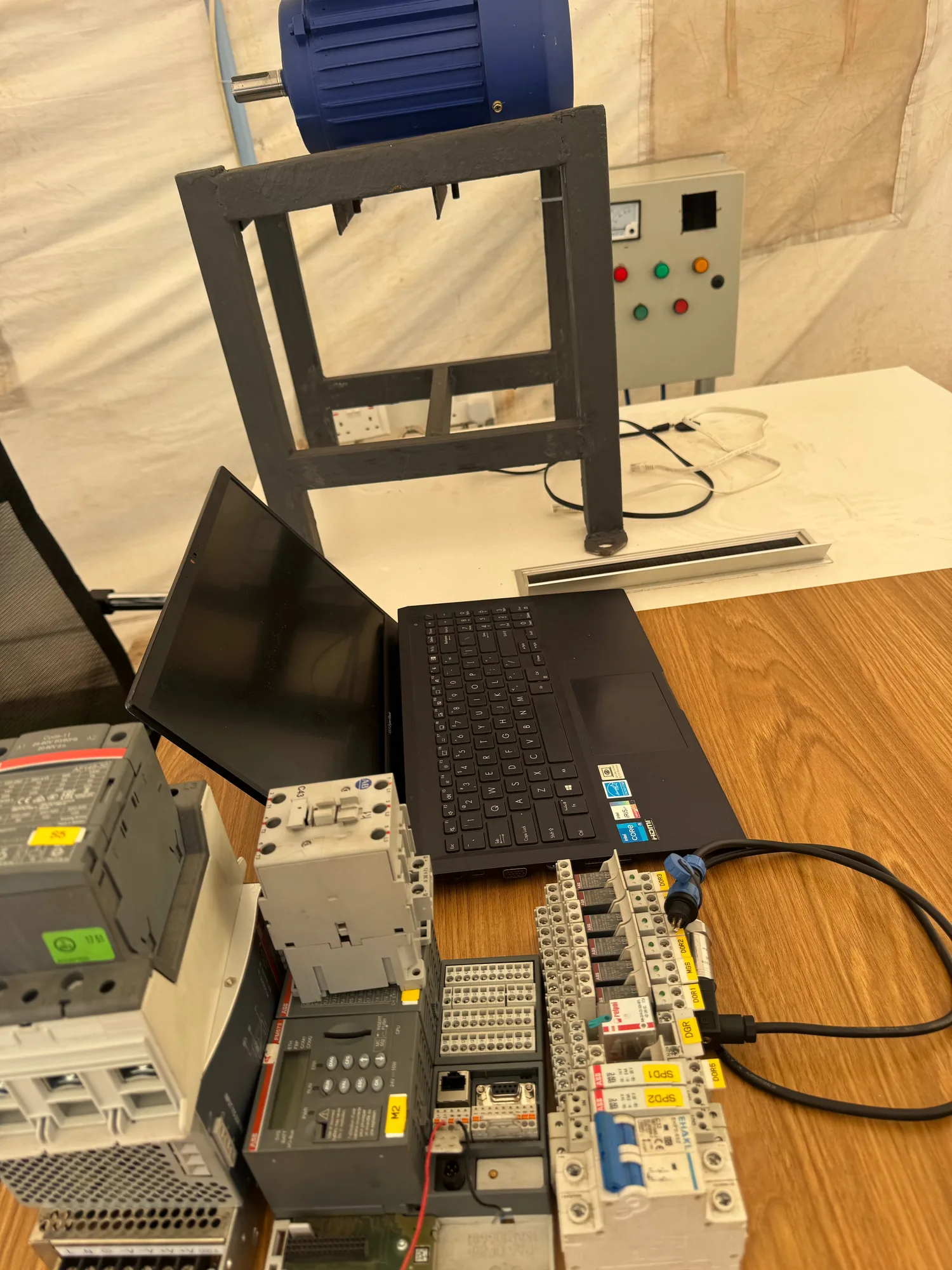 PLC rig with contactors, relays and laptop