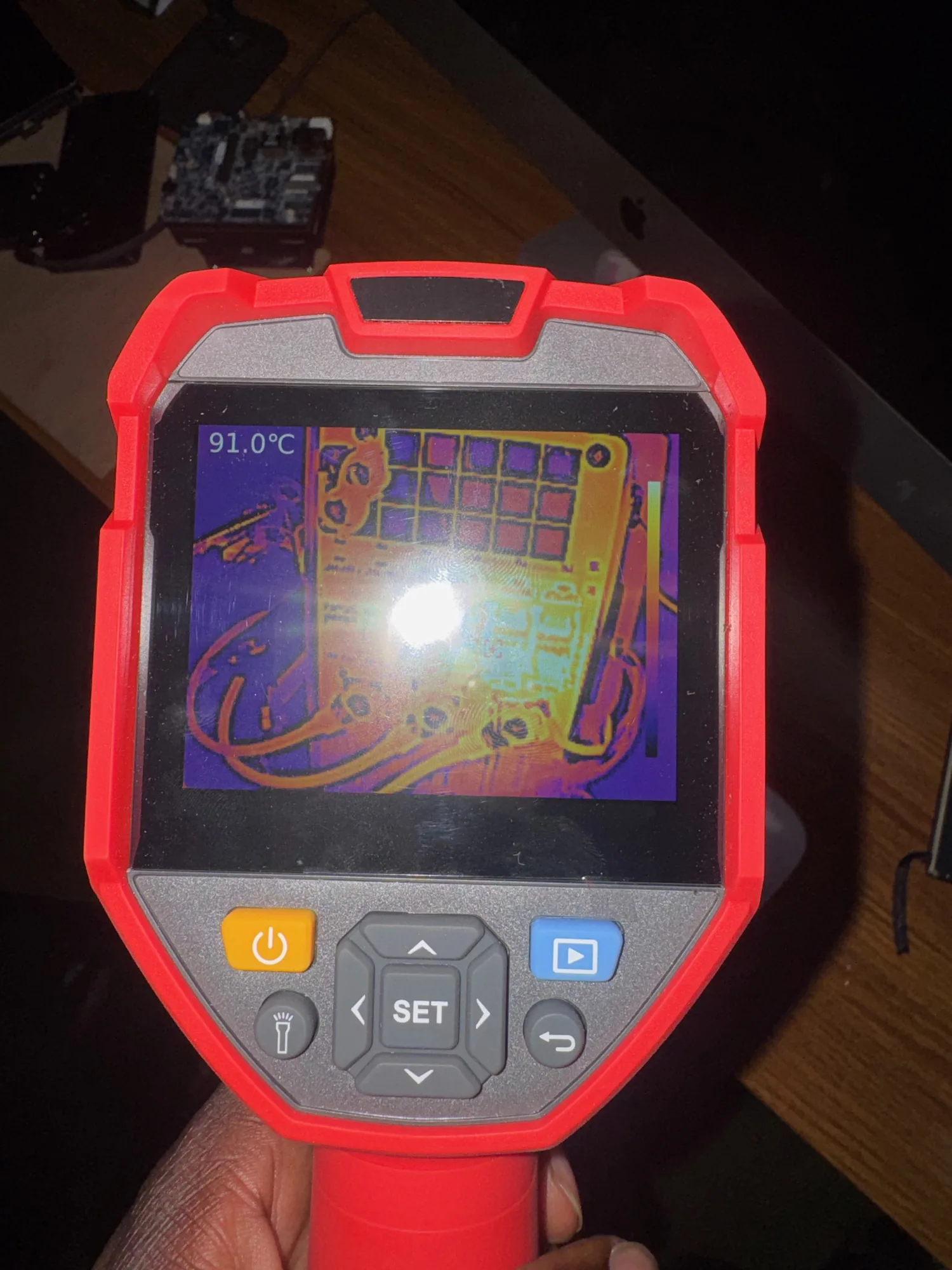 Thermal camera showing a 91 °C hotspot