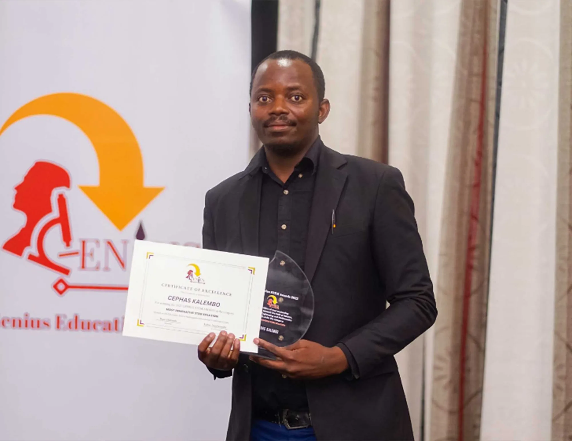 Receiving the Genius Zambia STEM award